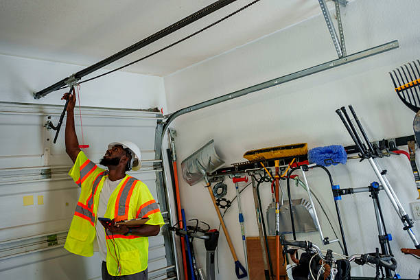 Professional Garage Door Maintenance technician working in Fargo, ND